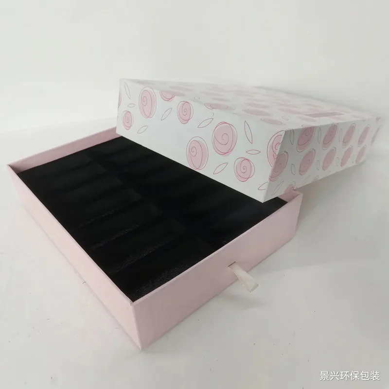 Lidded box with black foam tray