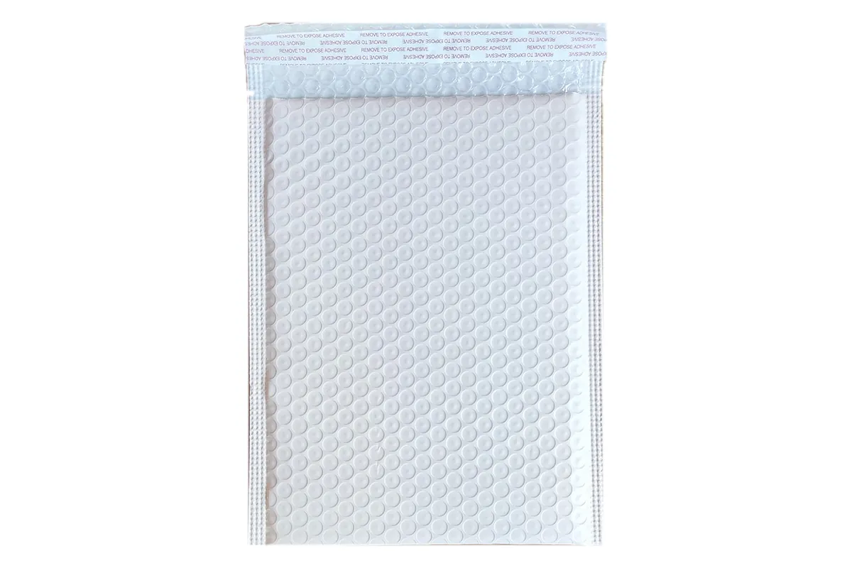 Pale pink bubble poly mailer with a peel-and-seal adhesive strip